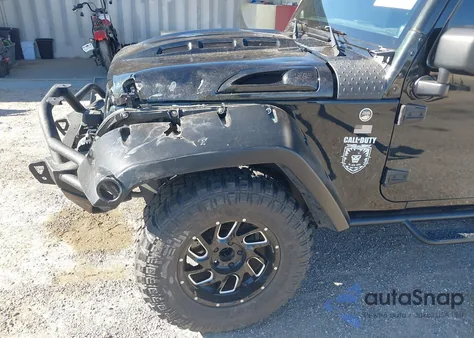 2012 Jeep Wrangler Unlimited Sport z USA, uszkodzony, nr VIN 1C4BJWDG5CL181809